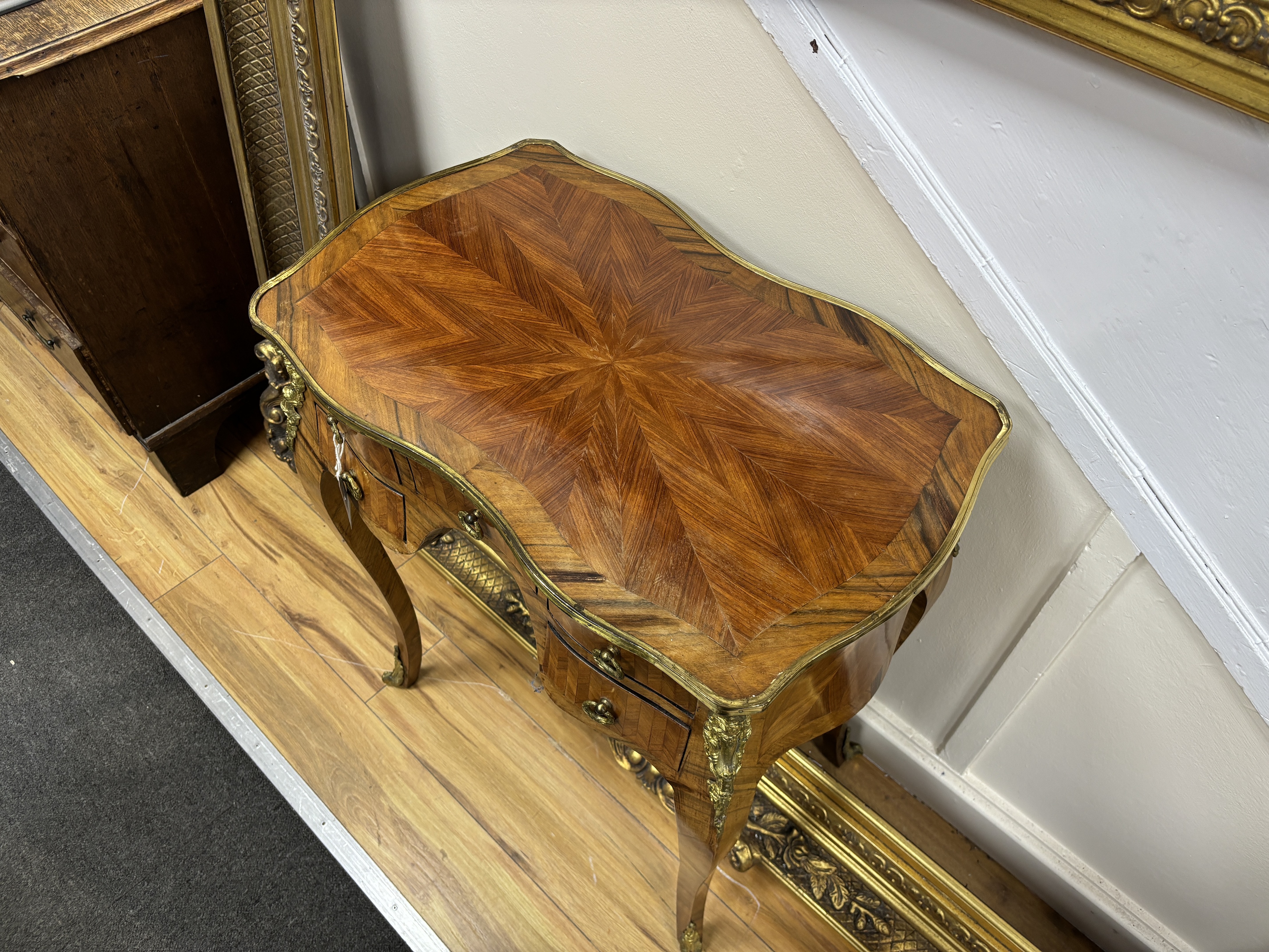 A French gilt metal mounted kingwood side table, width 67cm, depth 42cm, height 78cm